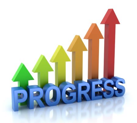 Graphic. The word 'Progress' in blue, with arrows pointing up, ranging from short green arrow on left to tall red arrow on right.