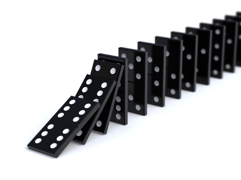 Domino bricks falling